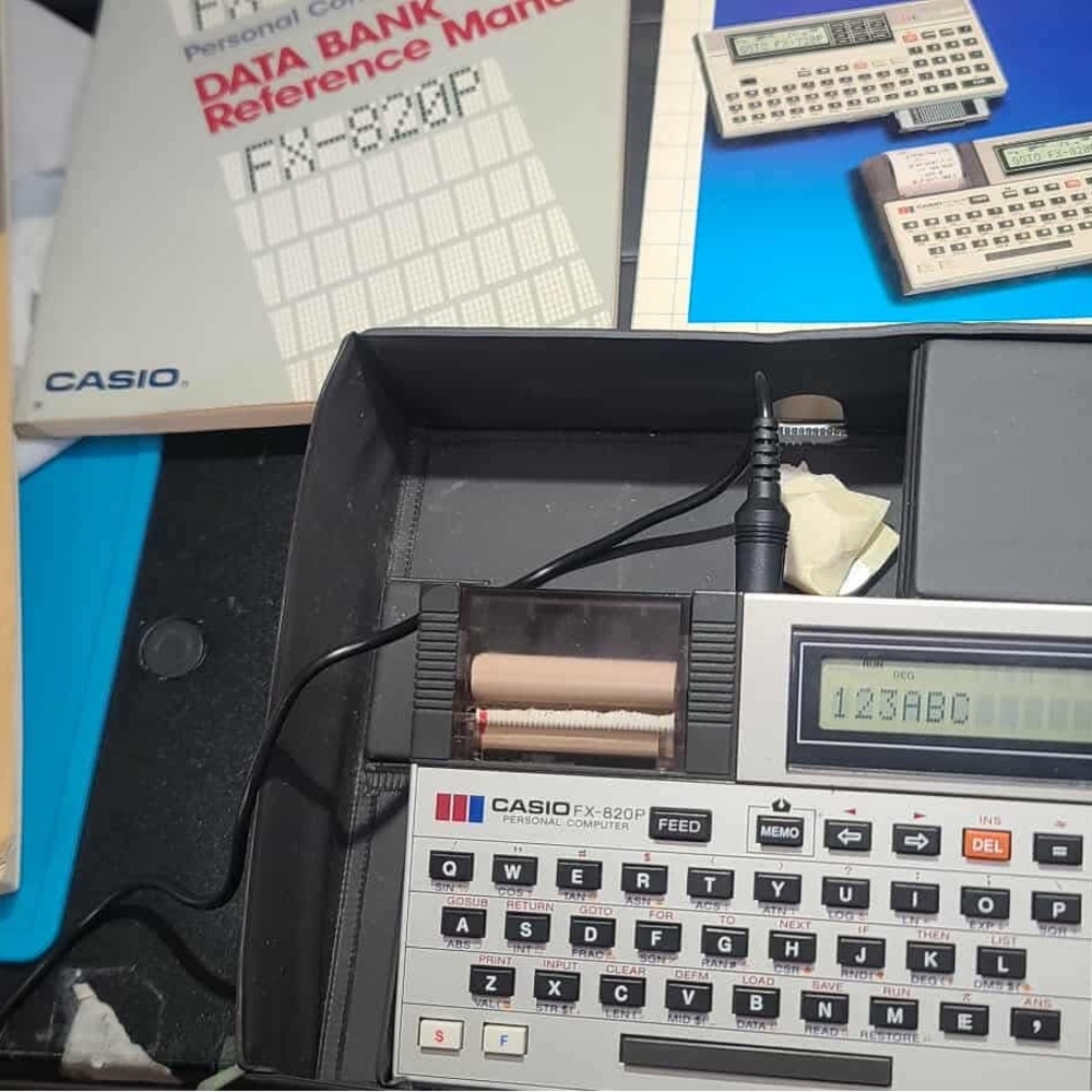 Casio FX-820P Electronic Organizer with Black and Gray Keys